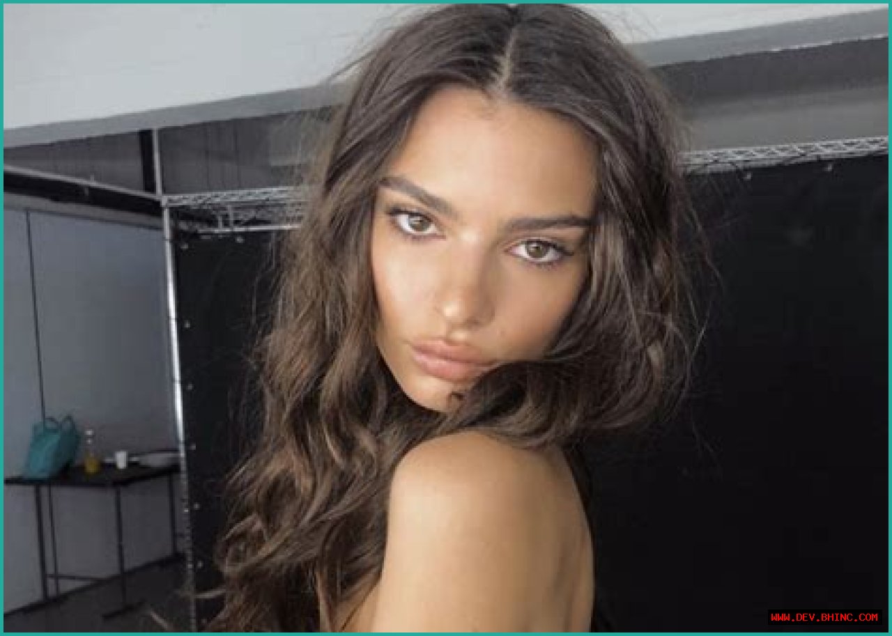 Emily Ratajkowski Puts On Cheeky Display In Barely-There Bathing Suit